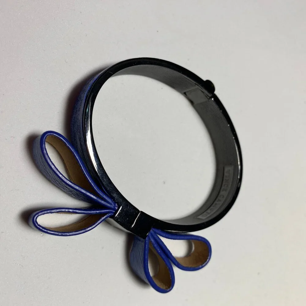 Vince Camuto Blue Bow Hinged Bracelet. Fits up to 6" wrist. - Picture 3 of 3